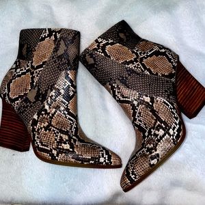 Leather snake smoke print booties.